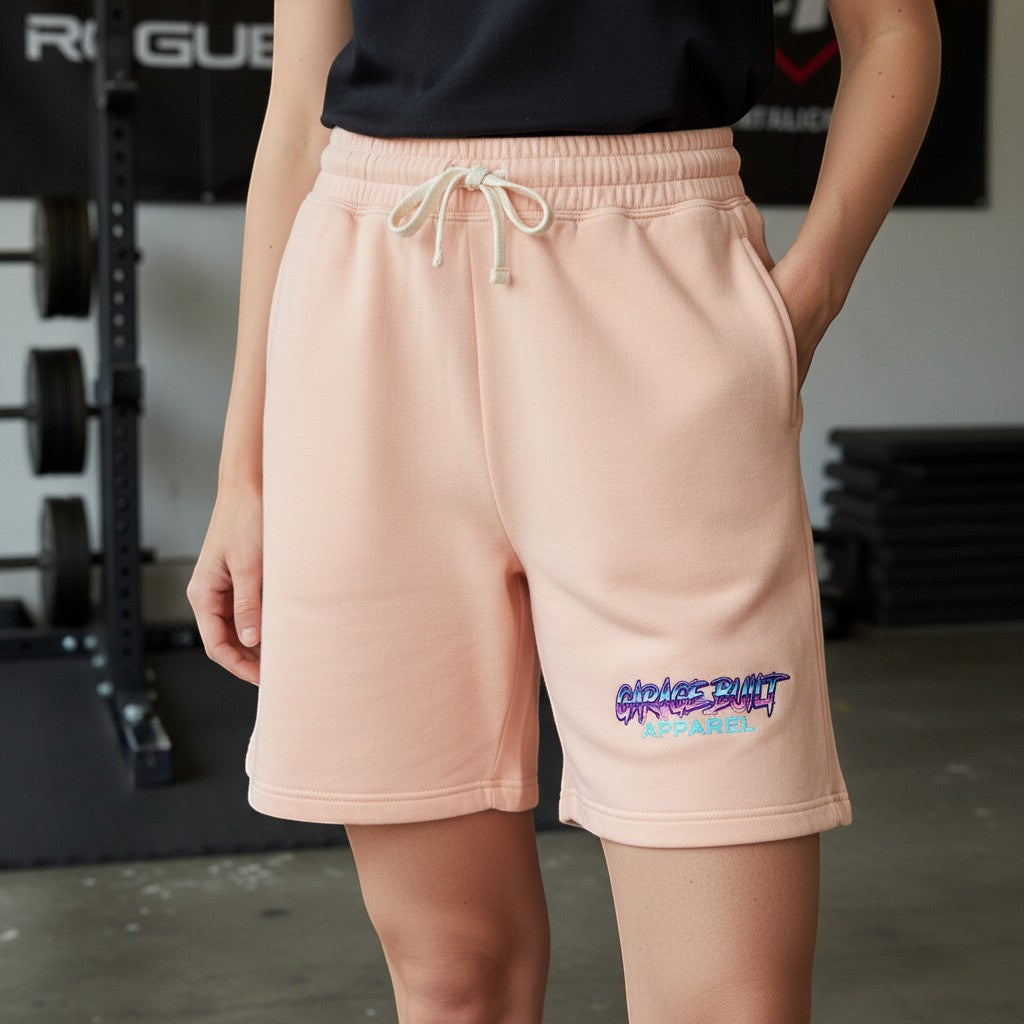 Garage Built Apparel light peach 100% cotton sweat shorts with synthwave logo, drawstring waist, and pockets.